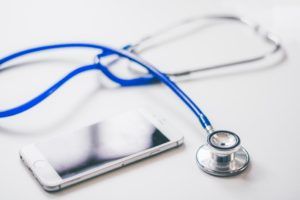 Learn more about the University of Sydney Doctor of Medicine program stethoscope and cell phone