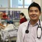 medical student with stethoscope around his neck