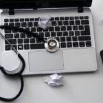 laptop with stethoscope