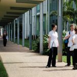 JCU Dentistry students standing outside of dental school