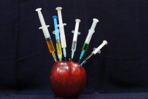 Find out more about studying public health apple with needles stuck in it