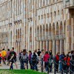 The University of Queensland Great Court with students walking