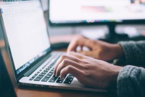 Are you interested in beginning your studies online? Learn more! laptop