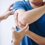 physiotherapist with patient