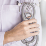 hand holding a stethoscope