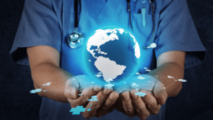 Find out more about Melbourne Master of Public Health degrree person wearing scrubs and stethoscope holding globe