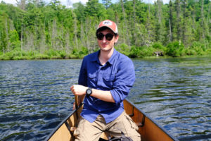 man in canoe