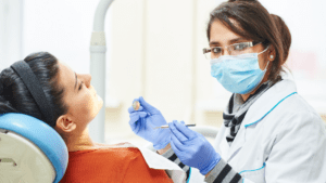 Learn more about Australian dental schools dentist with patient
