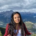 uq medical student in front of mountains