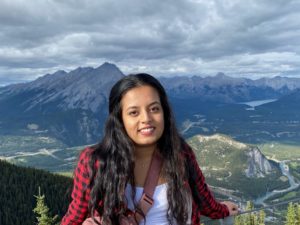 uq medical student in front of mountains