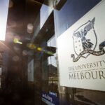 university of melbourne law school signage on building
