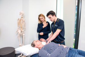 Flinders Master of Physiotherapy flinders physiotherapy student with patient