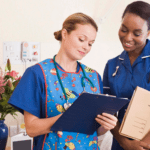 nursing students looking at chart