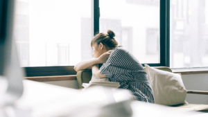 Learn more about getting ready to study in Australia homesick university student looking out window